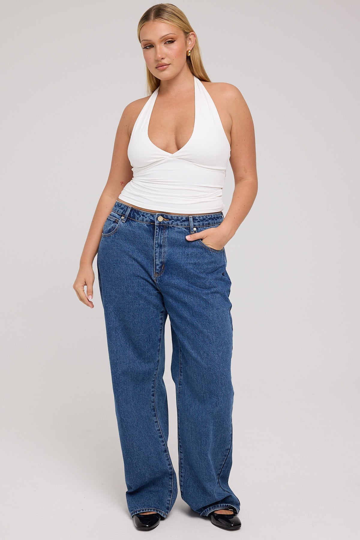 Jasmine is wearing a size 12