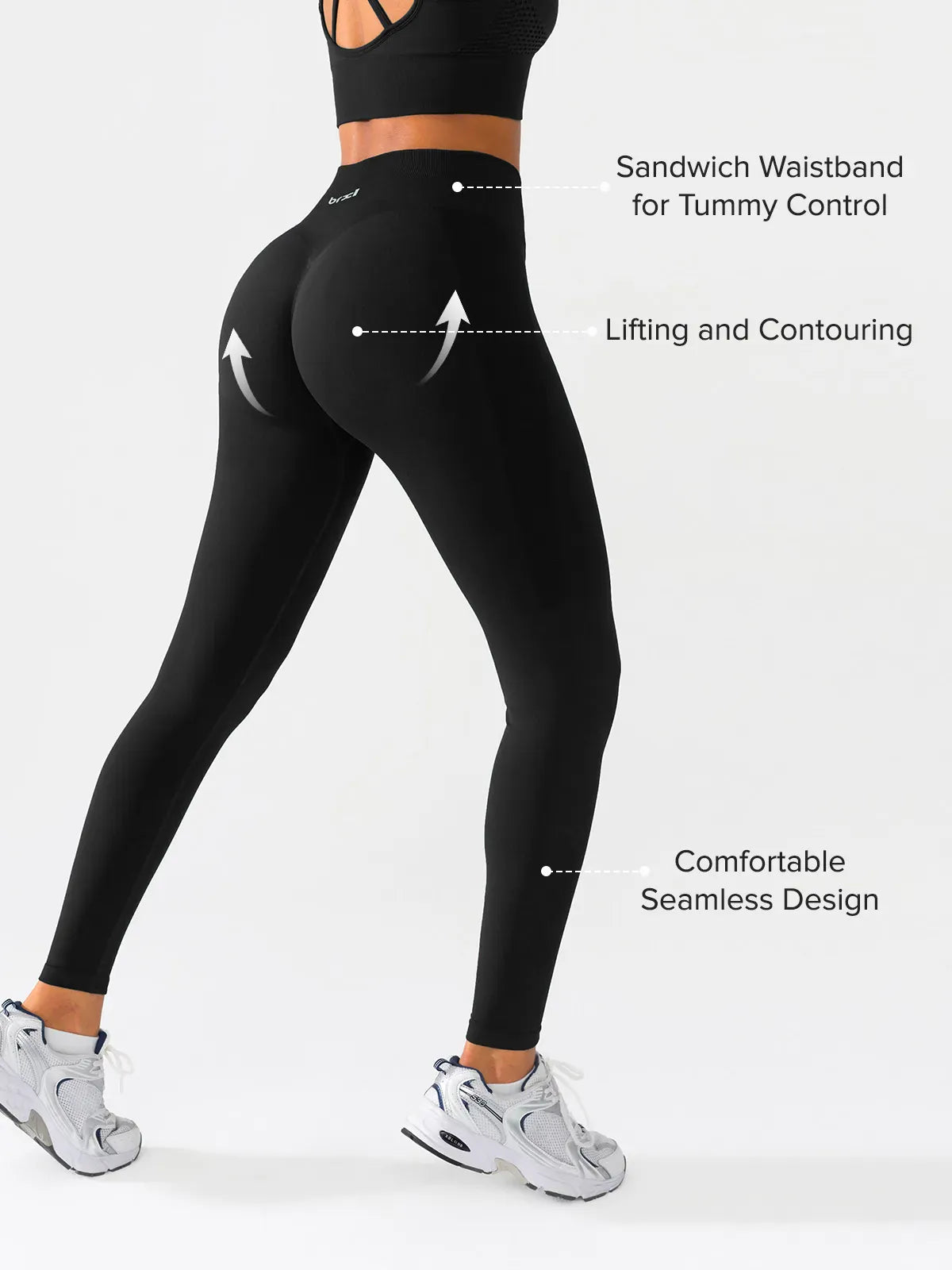 A model wearing a BRXL® Butt Lifting Seamless Bra Scrunch Leggings Set in